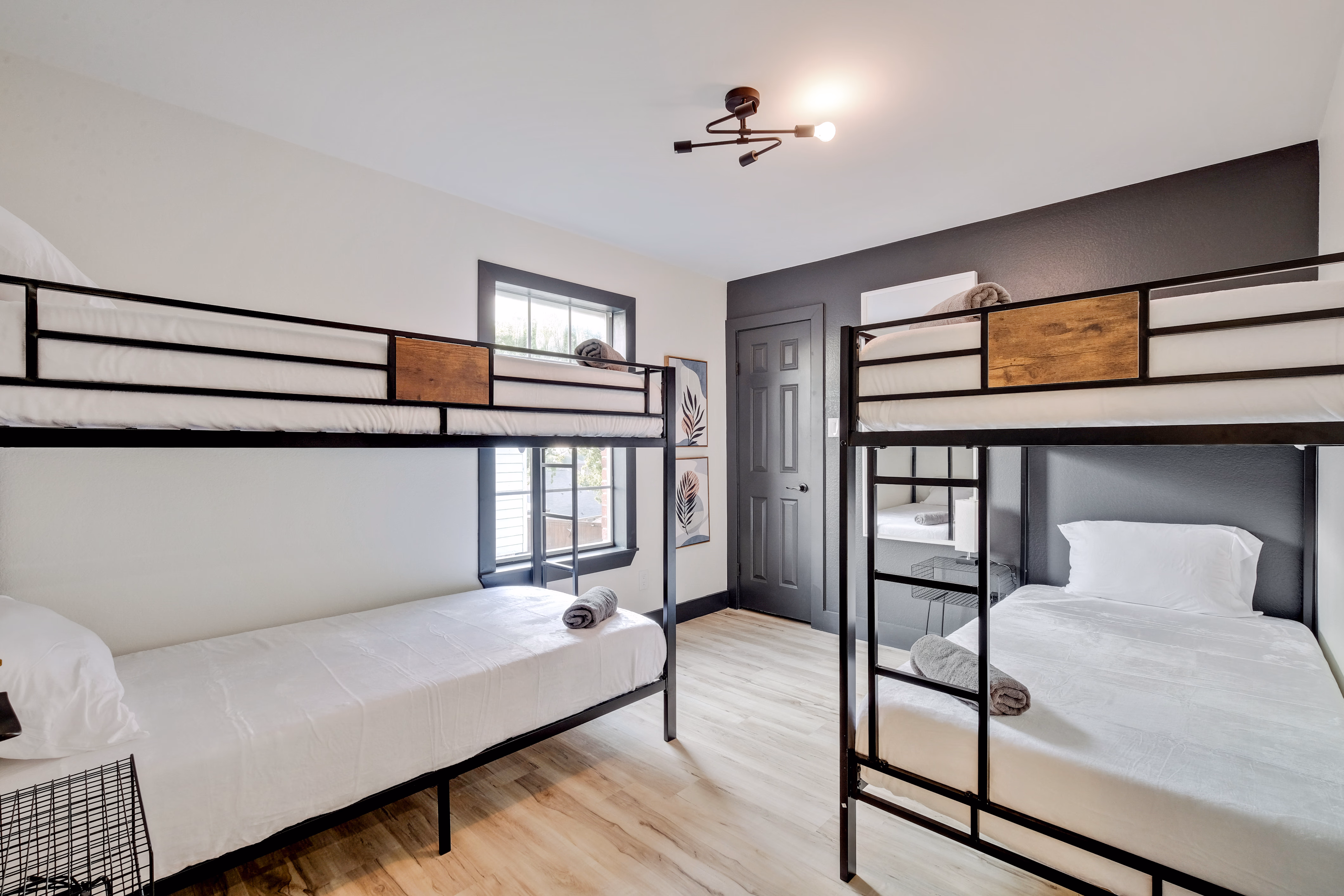 Bunk room — two sets of metal bunk beds facing each other.